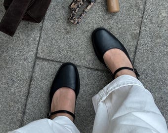 Svarta Mary Janes i läder: Klassiska och snygga skor