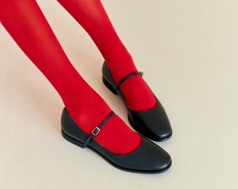 Chaussures plates noires classiques pour femme : style Mary Jane d'inspiration vintage avec des talons bas confortables