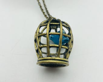 ヴィンテージ925スターリングシルバーチャームペンダント。鳥かごの中