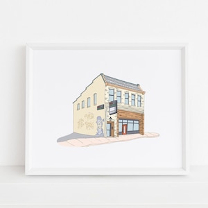 Puede incluir: Una ilustración dibujada a mano de un edificio de ladrillo amarillo con una puerta roja y un letrero que dice "The Grind". El edificio tiene una fachada de ladrillo y un techo gris. Hay una pequeña acera frente al edificio.