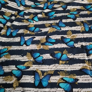 Jersey fabric by the yard Fabric knitted blue butterflies on a blue striped background cotton