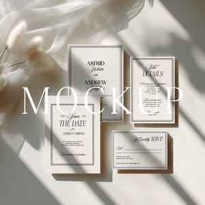 May include: A mockup of wedding stationery, including invitation cards and RSVP cards. The cards are off-white with black text and borders. The text includes the names "Astrid White and Andrew", "The Details", and "Save the Date".