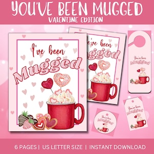 May include: Six printable Valentine's Day cards featuring a red mug filled with whipped cream, chocolate hearts, and a donut. The text on the cards reads "You've been Mugged" and "I've been Mugged".