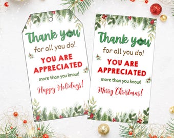 May include: Two printable gift tags with a green and red Christmas theme. The tags feature the text "Thank you for all you do! You are appreciated more than you know!" with the words "Happy Holidays!" on one tag and "Merry Christmas!" on the other.