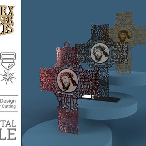 May include: Two laser cut wooden crosses with the Lord's Prayer and the words "Our Father" and "Jesus Christ" in a red and gold colour scheme.