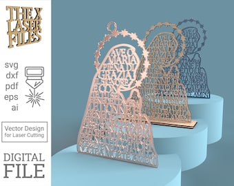 May include: A laser cut wooden cutout of the Virgin Mary with the words "Ave Maria, piena di grazia" in a decorative font. The cutout is in a light brown color and is standing on a blue surface.