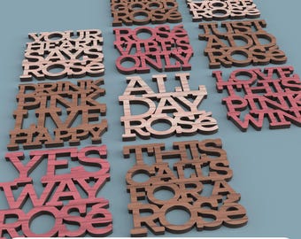 May include: A collection of laser-cut wooden signs with phrases like "Rose Vibes Only" and "All Day Rose." The signs are in various shades of brown and pink, with the words cut out. The bottom of the image reads "DIGITAL FILE FOR LASER CUTTING."