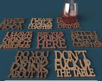 May include: A set of eight brown wooden coasters with laser-cut text including phrases like Please Use A Fucking Coaster, Park Your Drink Here, and Don't Fuck Up The Table, arranged with a glass of red liquid on a dark blue background.