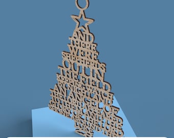 May include: Wooden Christmas tree ornament with a star and circle design. The tree is cut out with the words "AND THERE WERE SHEPHERDS OUT IN THE FIELD" and other text. The bottom of the image reads "DIGITAL FILE FOR LASER CUTTING".