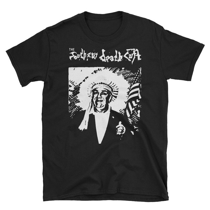 May include: Black t-shirt with a white graphic print of a person wearing a headdress and holding a flag. The text "THE SOUTHERN DEADLY" is printed above the graphic.