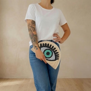 Taco shaped small straw purse with evil eye patch from Mexico