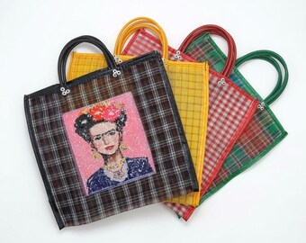 Plastic tote with Frida patch / reusable plastic grocery mesh bag