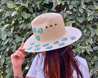 Mexican straw hat with eye decoration