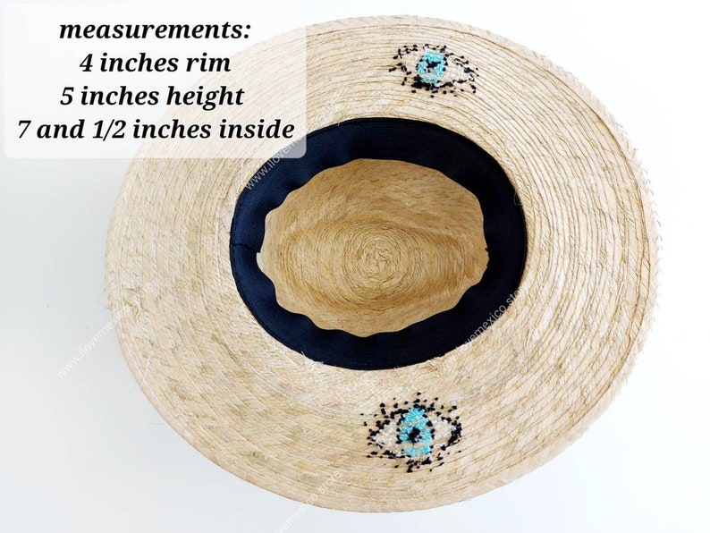 May include: A straw hat with a 4 inch rim, 5 inch height, and 7 1/2 inch inside diameter. The hat has a black band and turquoise and black beaded embellishments.