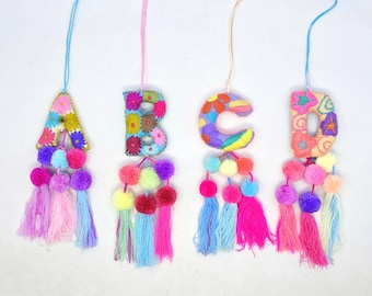 Embroidered Christmas Letter Ornament: Pastel Mexican Decor with Tassels