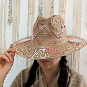 Mexican straw hat with embroidered decoration
