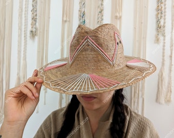 Mexican straw hat with embroidered decoration