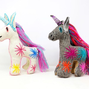Embroidered wool unicorn toy