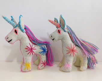 Embroidered wool unicorn toy