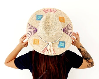 Mexican straw hat with embroidered decoration