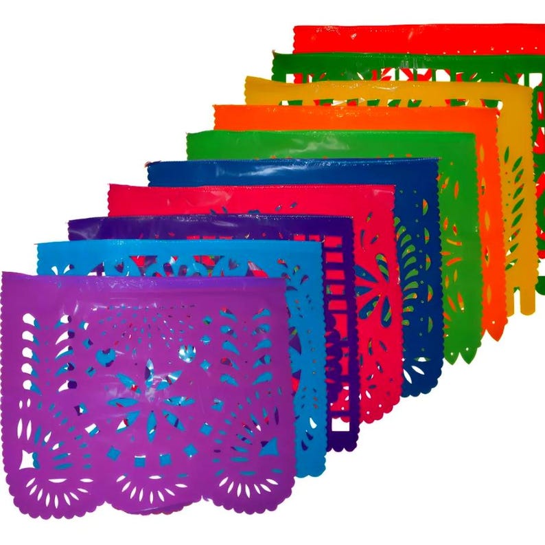May include: A set of ten colorful paper banners with intricate cut-out designs. The banners are arranged in a rainbow pattern, starting with red and ending with purple.