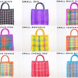 May include: A collection of nine small tote bags in various colors including sable black, iris, multi pink, orchid pink, merigold, tangerine, tiger orange, cherry red, and maya blue. Each bag features a plaid pattern and two top handles.