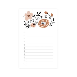 May include: A white to-do list with a floral design at the top. The text "LET'S DO THIS" is written in black. There are 10 blank lines with circles to check off.