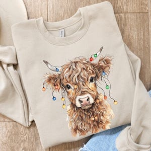 Cow Christmas Sweatshirt Highland Cow Christmas Sweater, , Highland Cow gift for her, Cow Christmas Gift, Cow Gifts, Christmas Lights Cow