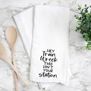 Flour sack towel, tea towel, hand towel, kitchen towel, funny tea towel.  flour sack towel, hey train wreck this isn’t your station