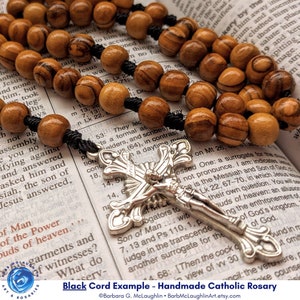 Lovely handmade five decade rosary with black nylon cord. The olivewood beads are semi-polished. This Catholic rosary makes a great gift for First Communion, Confirmation, RCIA, five year anniversaries, or other special occasions.