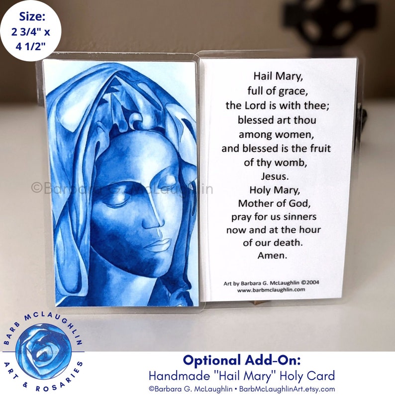 When buying this rosary, you have the option of adding on this handmade Hail Mary holy card. Art is taken from my original ink painting of the Blessed Virgin Mary. The Hail Mary prayer is on the reverse side of this laminated holy card.