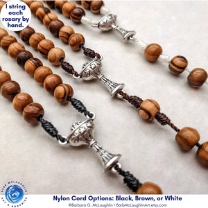 Handmade First Communion rosary with movable 7mm Holy Land olive olive wood beads, metal chalice centerpiece, Italian-made crucifix, and durable nylon cord. This Catholic rosary is available in your choice of black, brown, or white nylon cord.