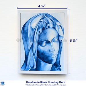 Handmade blank greeting card displayed on a piece of white watercolor paper - approximate size of 4.25 inches by 5.5 inches.