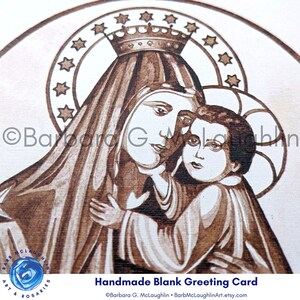 Close up of Our Lady of Mount Carmel and the Infant Jesus on the front of the printed card. This is a print of my original painting in brown permanent ink on watercolor paper. Free shipping in the US. US shipping only. ©Barbara G. McLaughlin