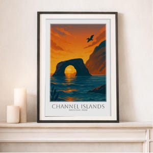 May include: Framed art print featuring a sunset over the Channel Islands National Park. The image shows a natural rock arch in the ocean, with a bird in flight against a vibrant orange and blue sky. The text "CHANNEL ISLANDS NATIONAL PARK" is at the bottom.