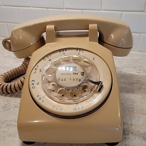 Vintage ITT Rotary Cream Colored Phone, non working condition