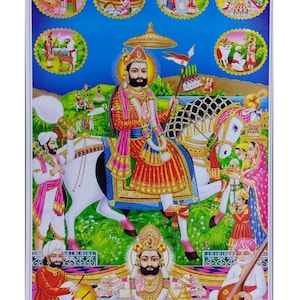 May include: A vibrant religious print featuring a central figure on horseback, adorned in ornate attire, surrounded by other figures and scenes. The artwork is rich in color, with a blue sky background and detailed illustrations in circular frames. The text at the bottom reads "Shri Ramdevji Ki Samapti".