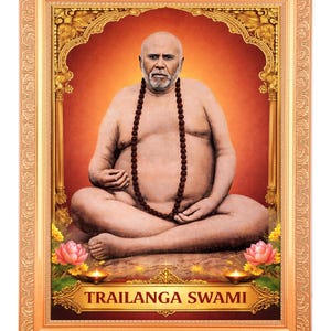 May include: A framed portrait of Trailanga Swami, a bald man with a white beard, seated in a meditative pose. He wears a beaded necklace. The image is set against a warm, reddish-orange background, with lotus flowers and candles at the bottom.