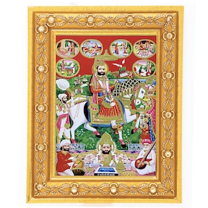 May include: A framed religious print featuring a colorful depiction of a deity riding a white horse. The print is surrounded by a gold frame with ornate details. The image includes several smaller scenes around the main figure, all set against a red background.