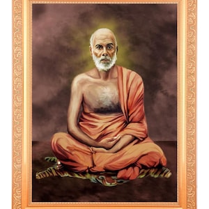 May include: A framed portrait of a man in orange robes, seated in a meditative pose. The man has a white beard and is framed in a gold-colored ornate frame. The background is a dark, muted brown.