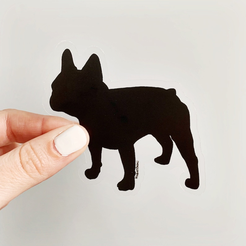 An illustration of a french bulldog silhouette in black, on a clear background