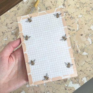 bee grid notepad, bees on honeycomb notepad, bee themed gift for beekeeper, bumblebee stationery, honeycomb illustration, grid paper notepad