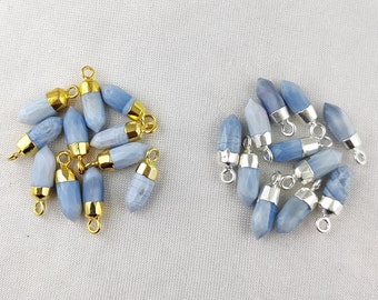 May include: A group of 15 blue agate gemstone pendants with gold and silver jump rings. The pendants are in the shape of a teardrop with a pointed tip.