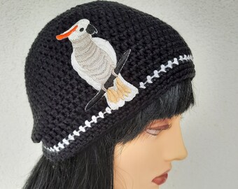 Beanie, black and white, cotton, approx. 53 - 56 cm head circumference, application white parrot, hand-sewn