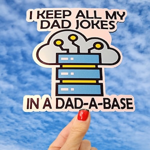 May include: A pink and white sticker with a cloud and a database icon. The text reads "I keep all my dad jokes in a dad-a-base".