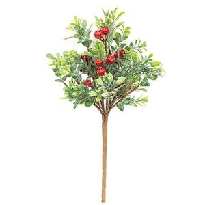 May include: A small artificial bush with red berries and green leaves. The bush is on a brown stem.