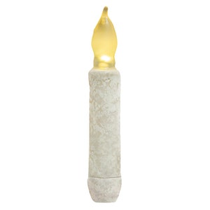 May include: A single, battery-operated, ivory-colored LED candle with a flickering, yellow flame. The candle has a textured, aged appearance, resembling a traditional wax candle. The base is a slightly darker shade of ivory.