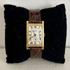 Montre Cartier Modèle Tank Or 18 KTS. Très bon état