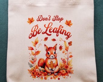 Cute Autumn Theme Tote Bag, Don't Stop Be Leafing, Humorous with Cute Squirrel & Fall Leaves, Durable Medium Size Tote Bag in Natural White