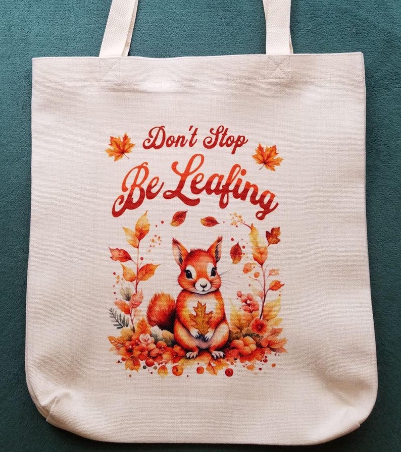 Cute Autumn Theme Tote Bag, Don't Stop Be Leafing, Humorous with Cute Squirrel & Fall Leaves, Durable Medium Size Tote Bag in Natural White image 1
